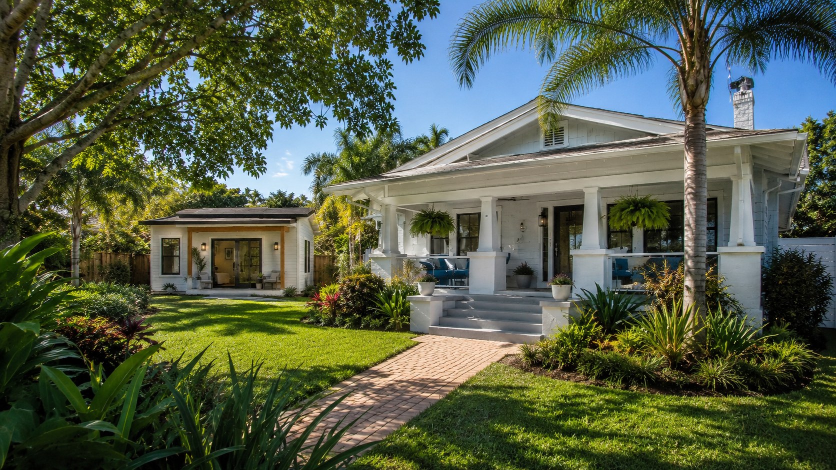 Main house with detached ADU in a lush St. Petersburg backyard